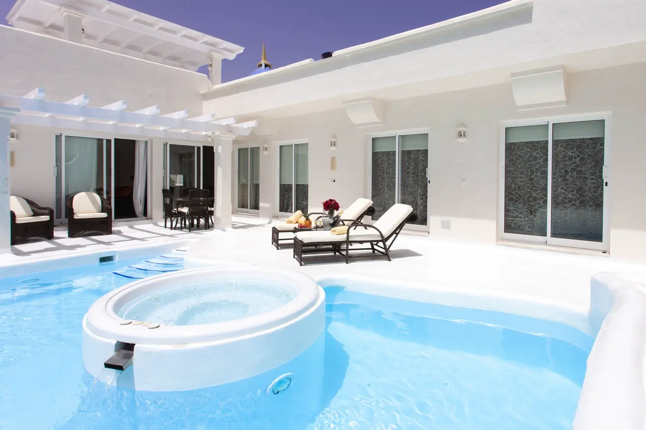 sun-loungers-relaxing-pool-with-jacuzzi Large